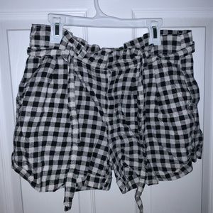 Black and white checkered shorts with belt